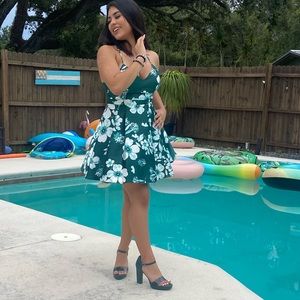 Green medium sized outgoing green dress. Only worn once for this picture.